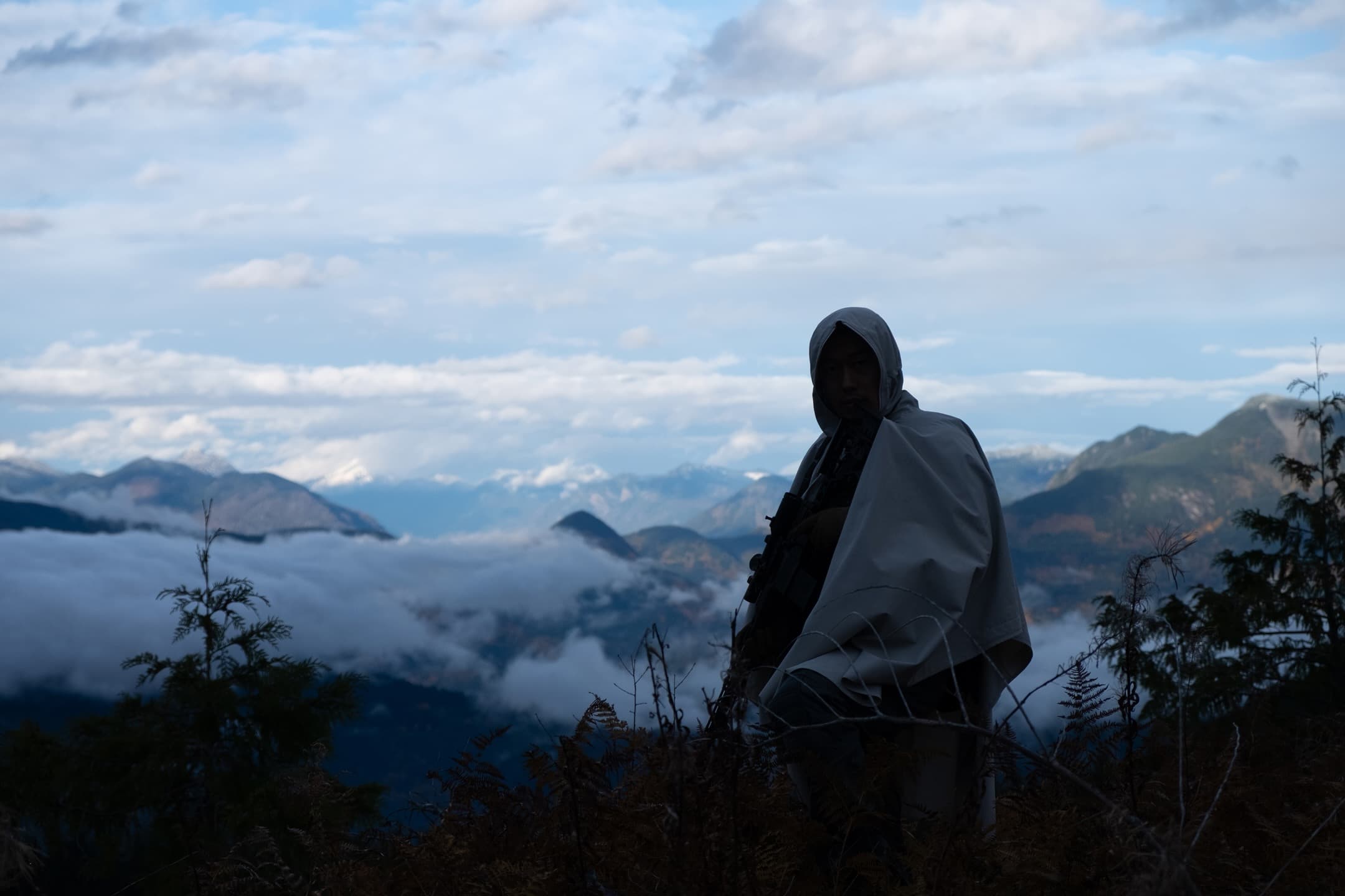 Person wearing Terrain Unknown gear in mountainous terrain